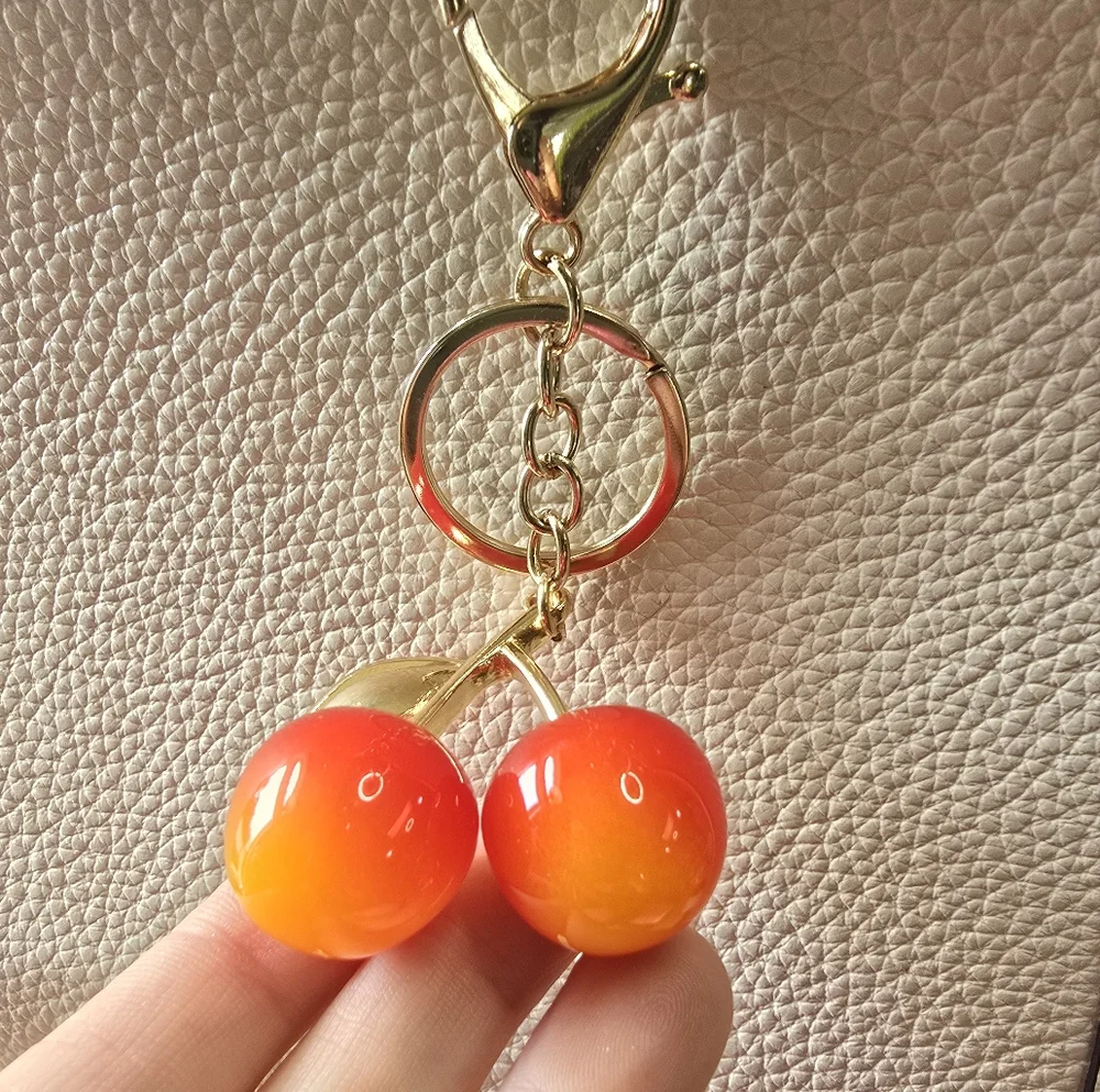 Cherry Keychain with Gold Accents